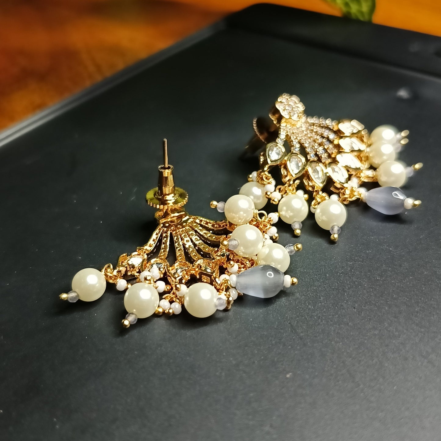 Kundan earrings with pearl cluster